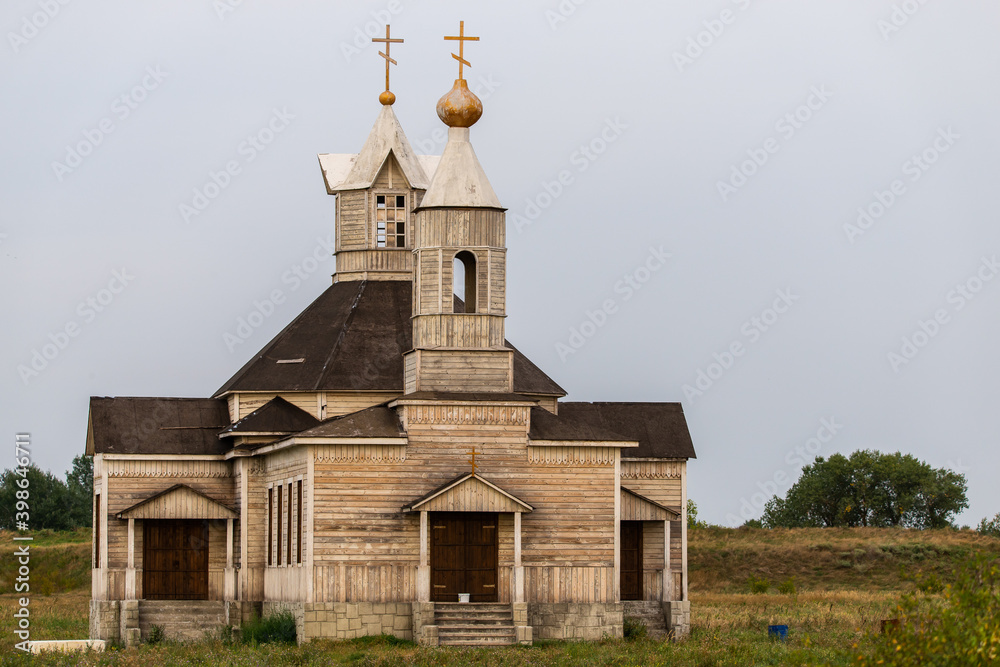 Traditional old russian wooden church in ancient town