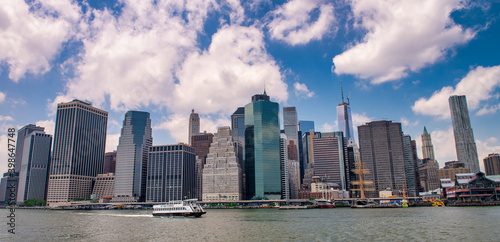 NEW YORK CITY - JUNE 10, 2013: Downtown Manhattan skyline on a beautiful sunny day