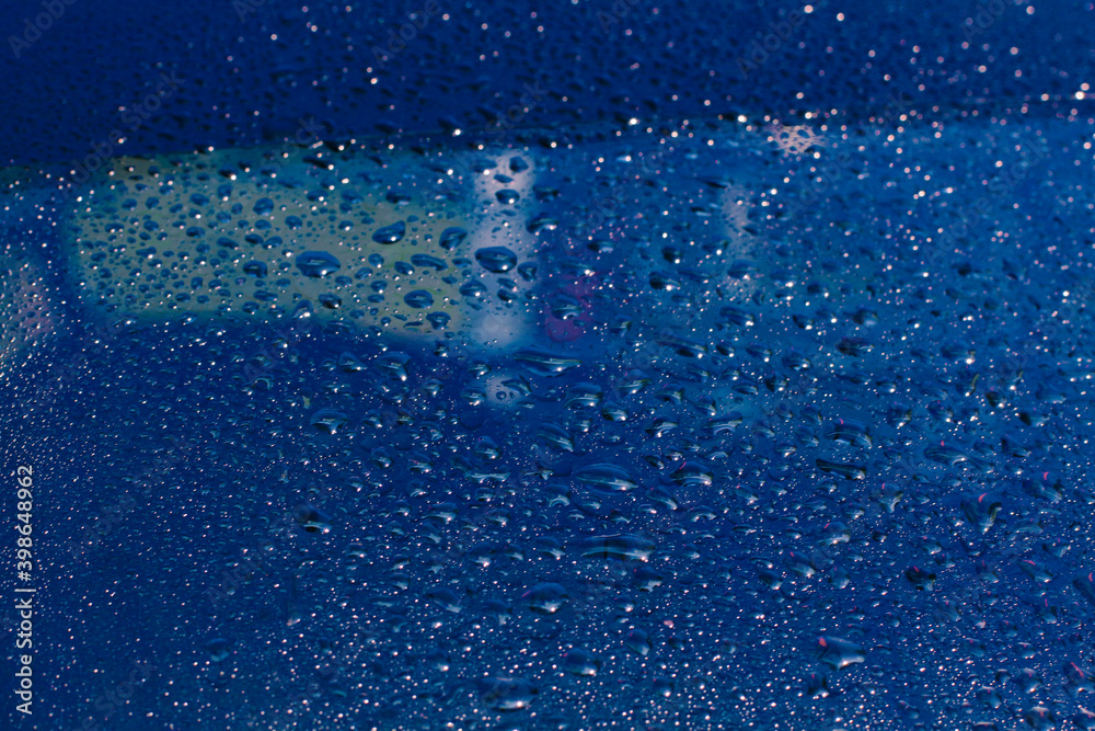 Water rain drops blue Vintage on glass wall on car rain drops on clear window or rain droplets on glass Of Raindrops Or Vapor Trough Window Glass Water droplets blue and Rain droplets
