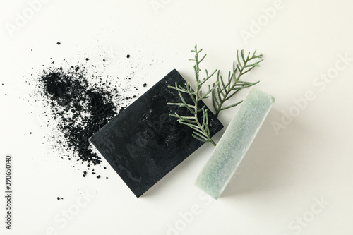 Pieces of natural handmade soap on white background