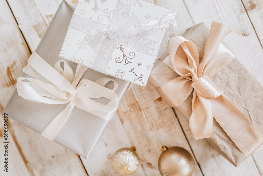 New Year gifts and Christmas toys on wooden floor