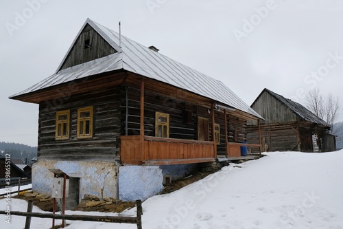 Interesting traditional wooden buildings in Sumiac (Šumiac) village, lying at feet of Kralova hola in Low Tatras in Slovakia