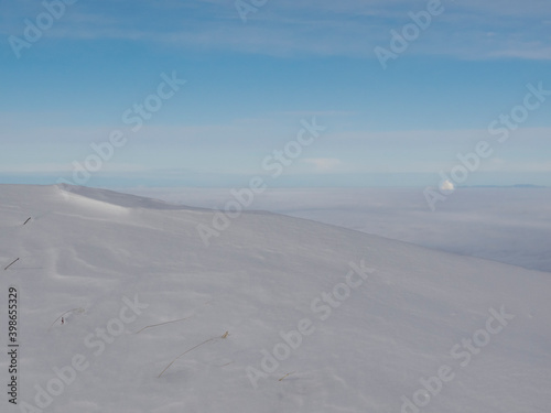 View over the snowdrift into the valley 
