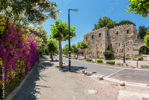 Ancient Roman Agora wall and colorful street view in Kos Town 