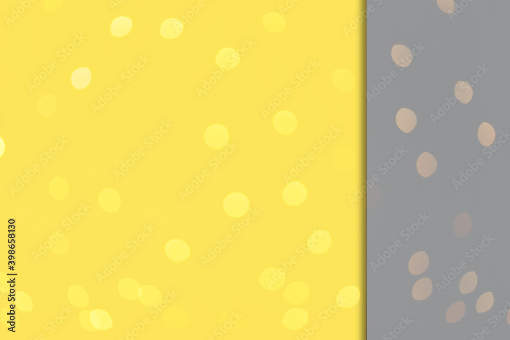 Abstract background with bokeh lights the color of the year 2021 yellow and gray. High quality photo
