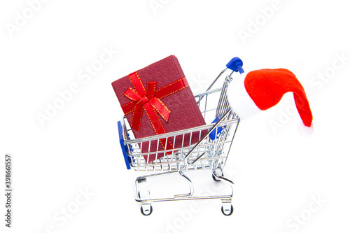 Cart with gifts on a white background . New Year and Christmas. Buying gifts. Online purchases. Preparation for the holiday. The choice of gifts. © alenka2194