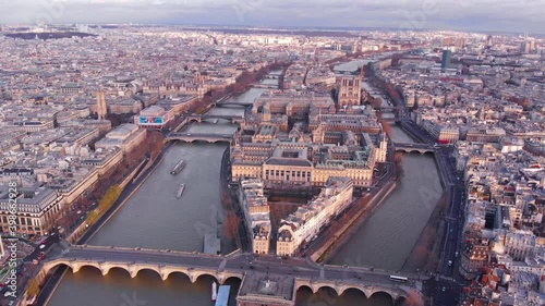 Pont Neuf, Ile de la Cite and sophisticated Pompidou Centre in the sunny evening, aerial footage