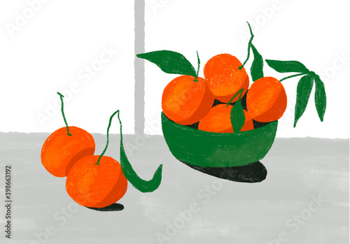 Mandarins in a green bowl