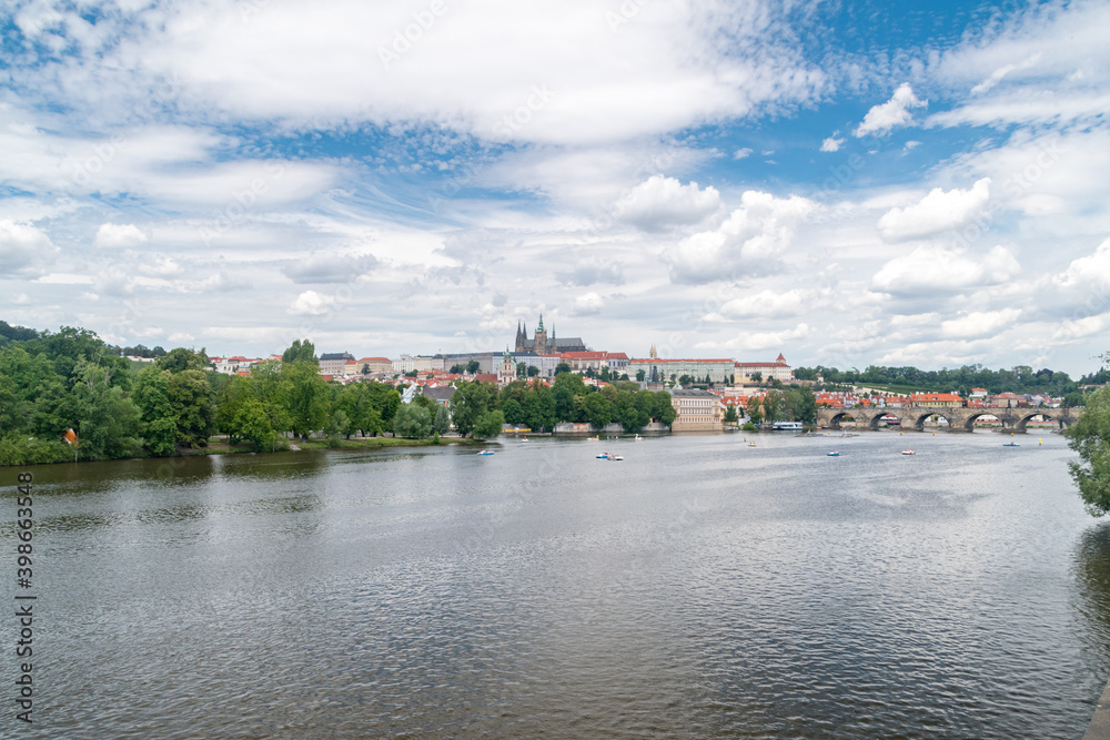 Obraz premium View old town of Prague on Vltava river at summer time.