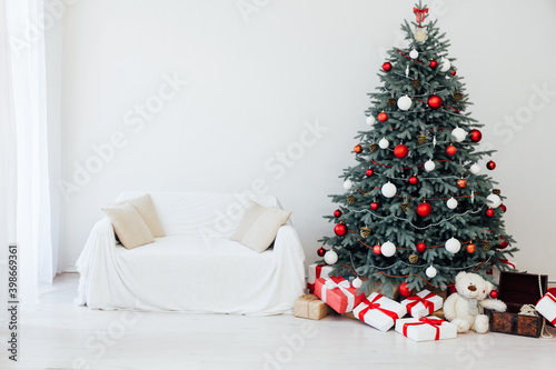The interior of the white room Christmas tree New Year holiday gifts decor