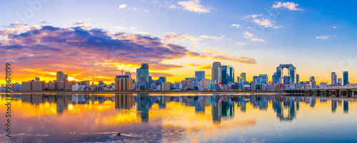 Beautiful sunrise view of Osaka city skyline. Japan  photo