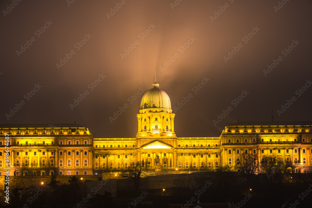 Illuminated dome of the historic Royal Palace at Buda Castle in Budapest. Hungary 
