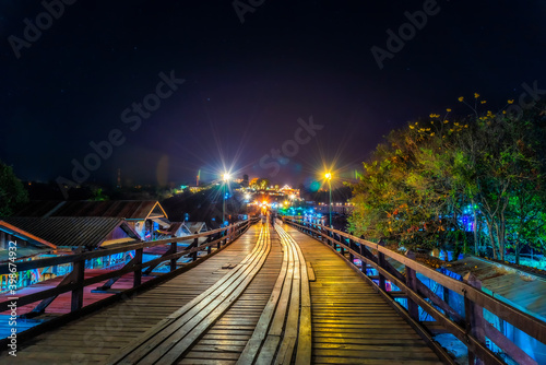 Kanchanaburi, Thailand - Januaey 26-2020 : Sangklaburi Bridge or Mon Bridge at night © silaphop