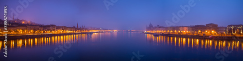 Panorama of Budapest at dusk overlooking Buda and Pest sides of the city. Hungary