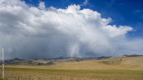 Spectacular sky above high-altitude desert along Pamir Highway between Ak Baital pass and Karakul lake, Murghab district, Gorno-Badakshan, Tajikistan