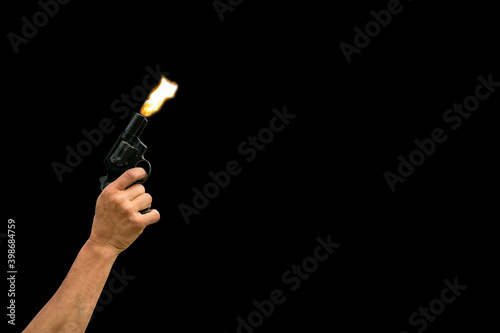 Wallpaper Mural Shooting a hand gun on black background Torontodigital.ca