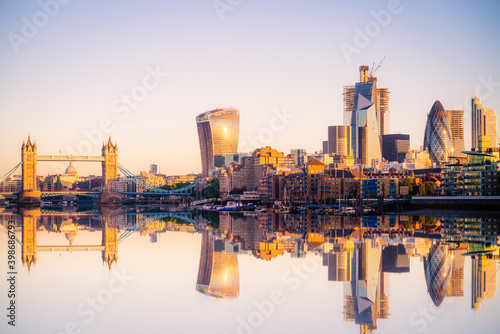 Tower Bridge and the bank district of central London with reflection