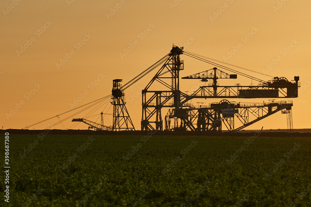 Coal mining excavators and the surrounding nature Coal mining excavators and the surrounding nature