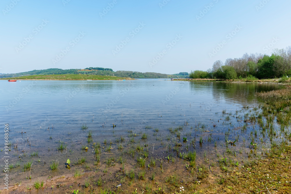 On the shores of Carsington Reservoir in Derbyshire on \ bright spring morning