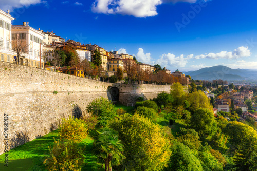 Beautiful Porta San Giacomo gate and the city walls of Citta Alta old town in Bergamo, Italy