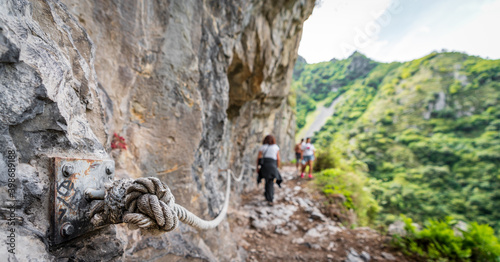 Safety rope on the wall in a dangerous track