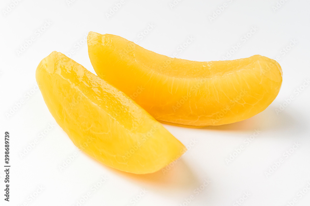 Canned peaches on a white background Canned peaches on a white background