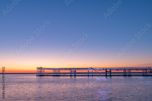 Mining pier known as the Tinto Dock "Muelle del Tinto" at close night . This is one of the remains left by the English in Huelva. © Alfredo