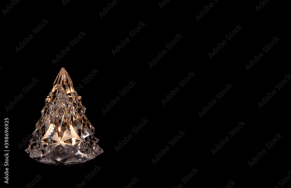 Fototapeta premium Crystal white christmas tree decoration element isolated on dark background