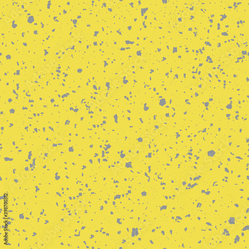 Yellow and gray hand crafted terrazzo pattern background. Backdrop of dense coarse grained stone granite particles. Abstract igneous rock texture of mineral crystals. Textural all over print.