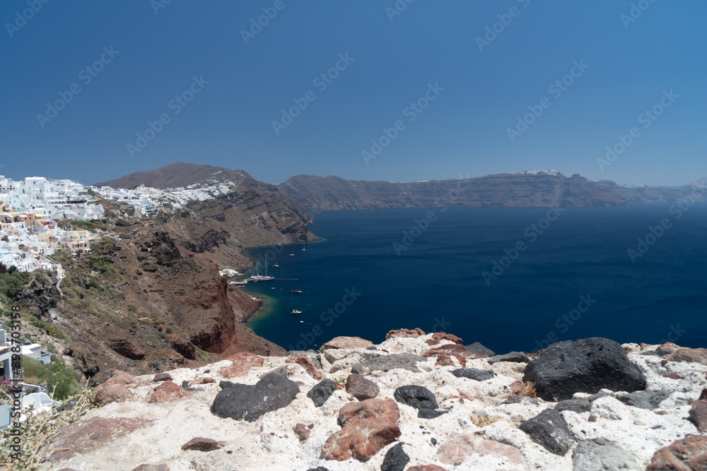 Panorama of Santorini island. Colorful spring view of famous Greek resort Fira, Greece, Europe. Traveling concept background. Vivid colors.