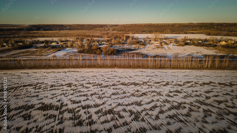 patterns made by wind and snow in the fields
