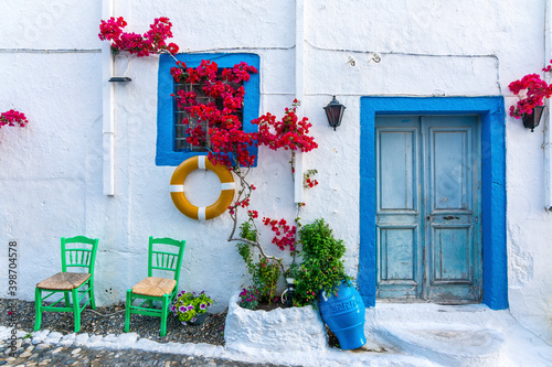 Fototapeta Naklejka Na Ścianę i Meble -  Beautiful street view in Kos Island. Kos Island is a popular tourist destination in Greece.