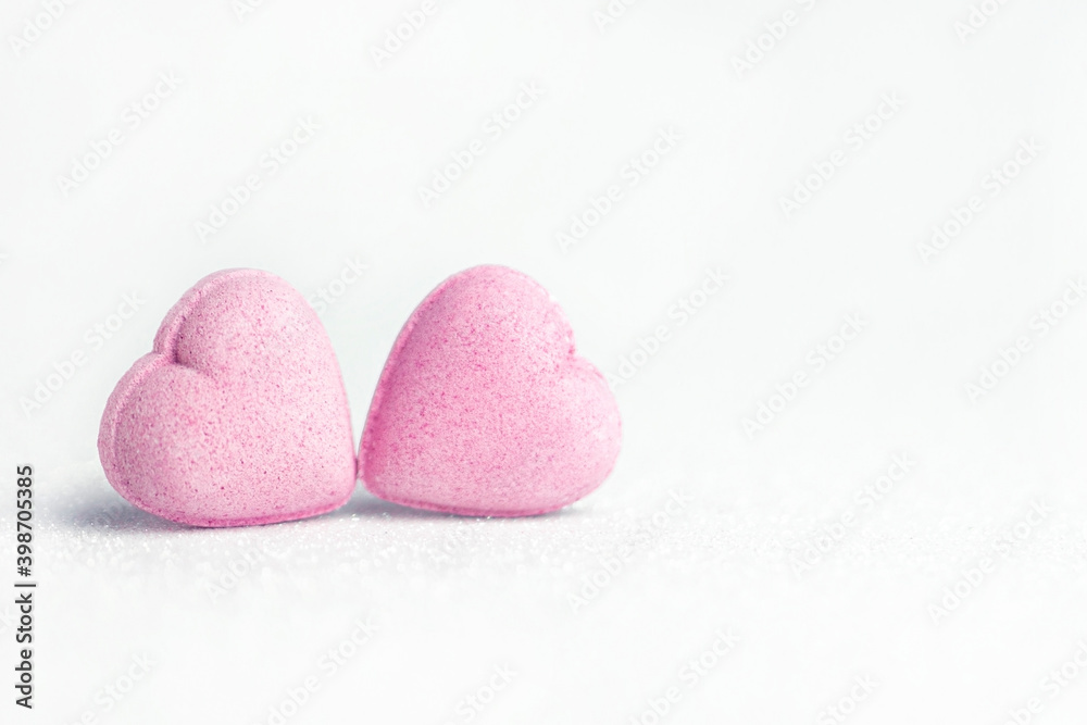 Pink heardts on white glitter background . Valentines day concept . Pink heardts on white glitter background . Valentines day concept .