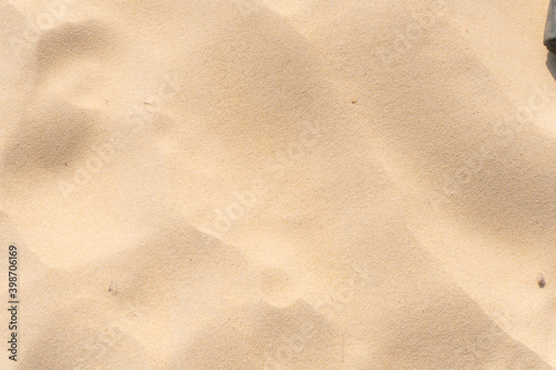 sand texture on the beach in summer sun