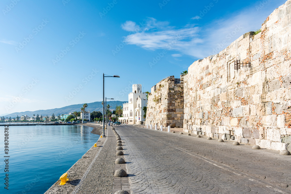 Naklejka premium Town Harbour and Neratzia Castle wall view in Kos Island. Kos Island is populer tourist destination in Greece.