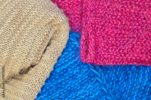 colored knitted warm wool texture or background close-up