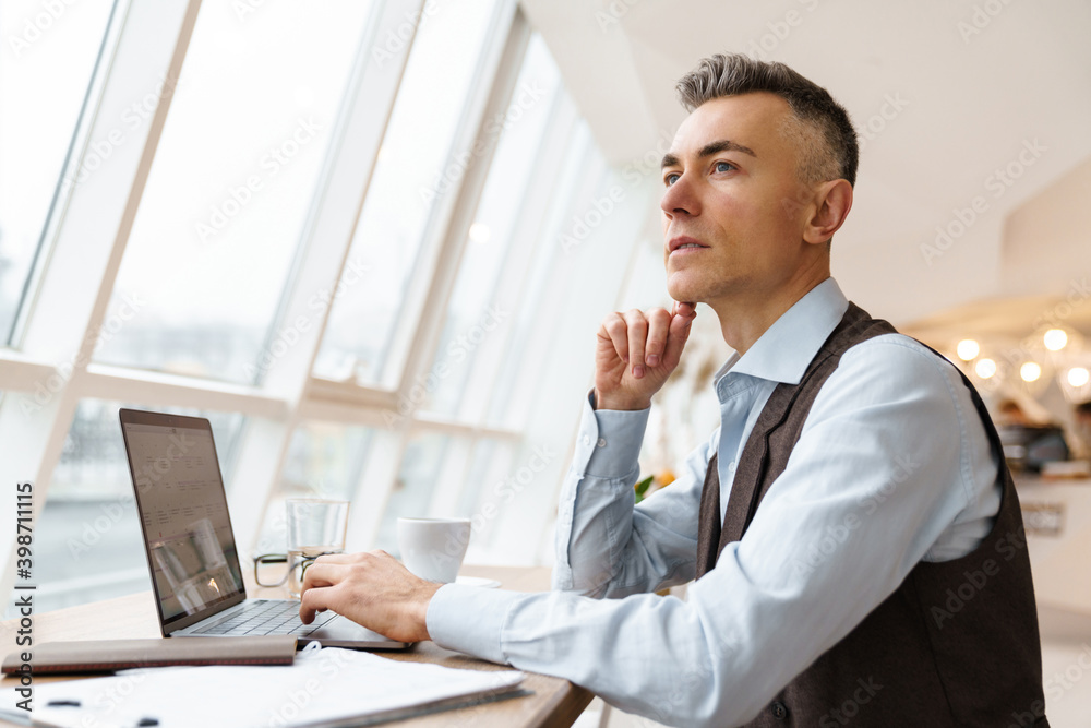 Confident handsome businessman in smart clothes Confident handsome businessman in smart clothes