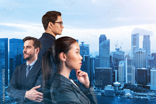 Canvas Print Group of three business colleagues in suits dreaming about new career opportunities after MBA graduation