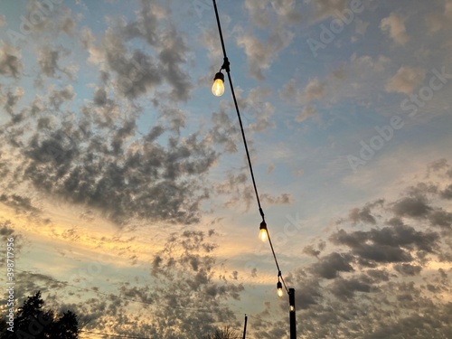 string lights against the sunset