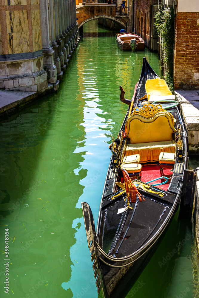 typical old gondola in venice