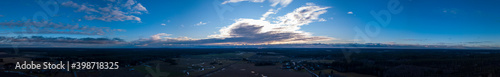 Panoramic sunset over the lake and forest in the countryside town of Skinnarby  Finland.