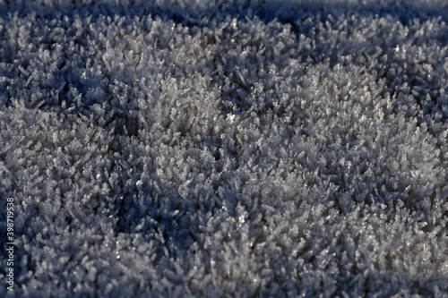 Crystal surface. Selective focus. The snow crystals. © Olga