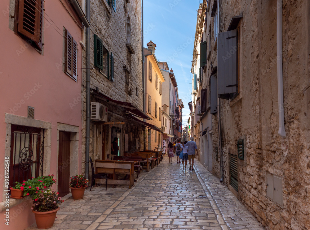 Rovinj, Croatia - August 17 2019: Cobblestone street in the historic heart of Rovinj
