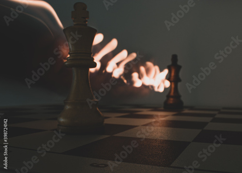 Abstract chess pieces on a chess board