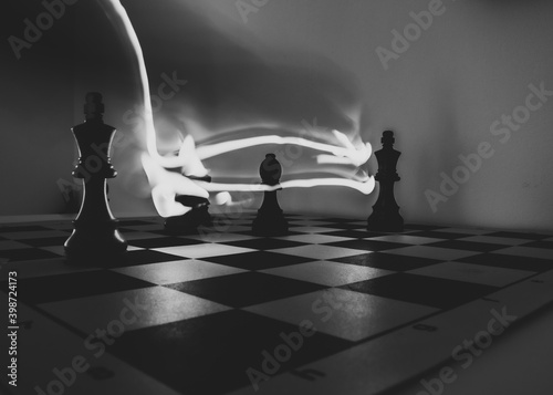 Abstract chess pieces on a chess board