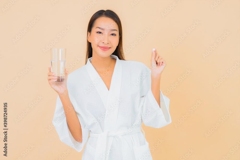 Portrait beautiful young asian woman with water glass and drug pill Portrait beautiful young asian woman with water glass and drug pill