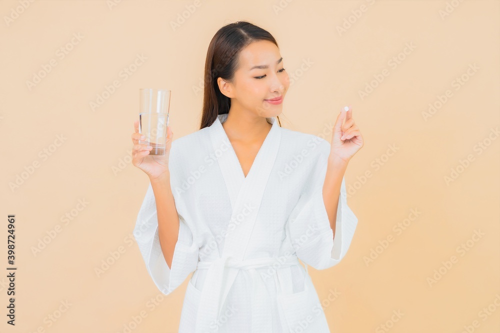 Portrait beautiful young asian woman with water glass and drug pill Portrait beautiful young asian woman with water glass and drug pill