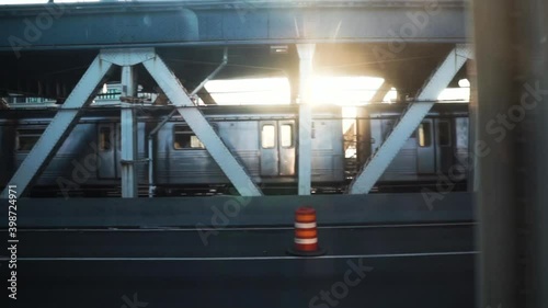 Train subway passing next to another train at dusk - Slow motion
