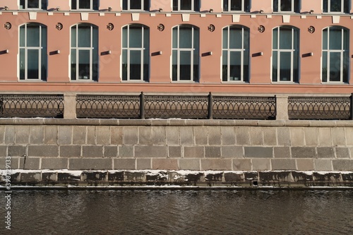 Photography Water surface, granite embankment, metal fence, house facade, Moscow, background