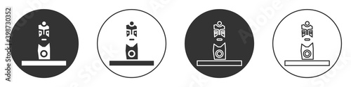 Black Slavic pagan idol icon isolated on white background. Antique ritual wooden idol. Circle button. Vector.